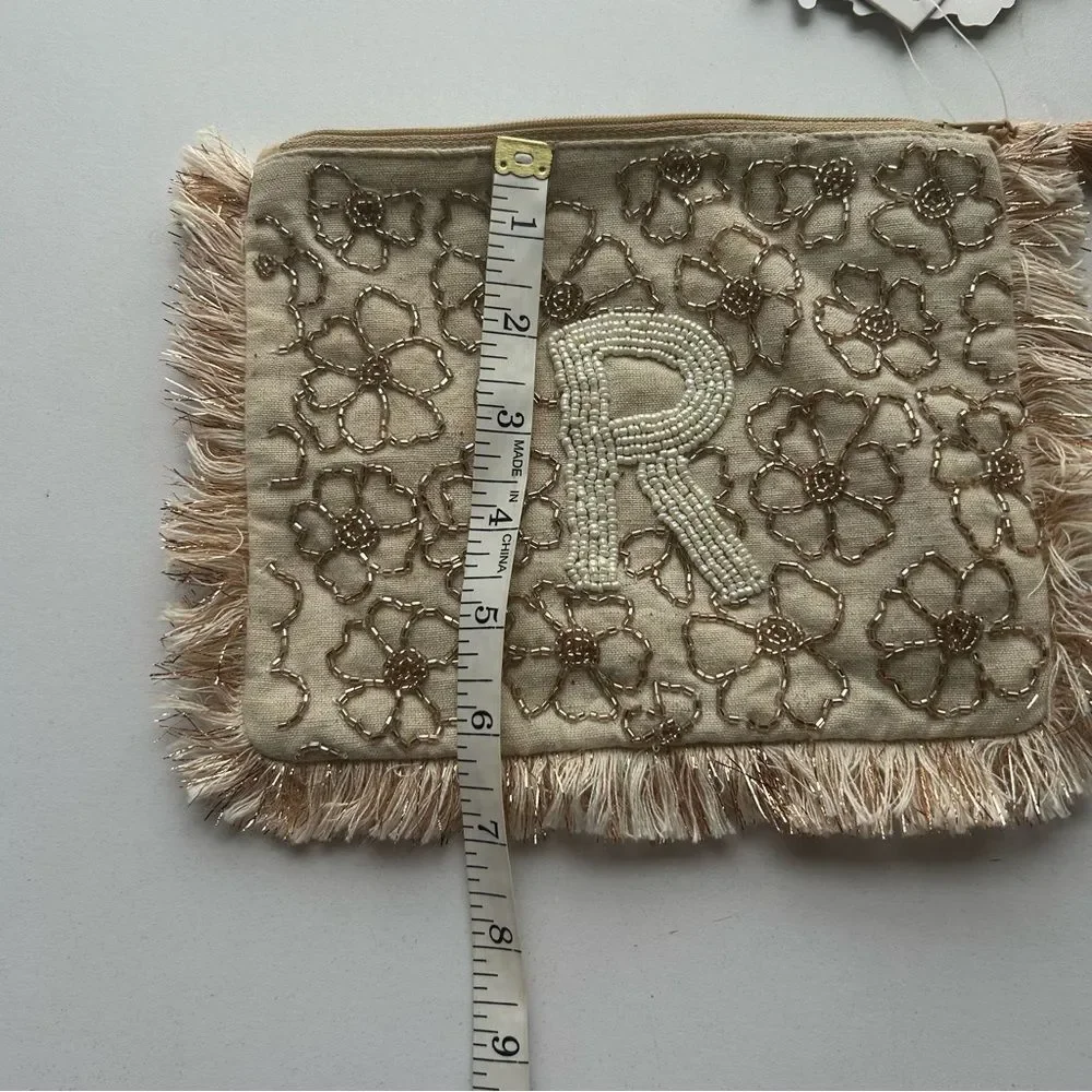 Elegant Floral Beige Clutch with Fringe Anthropologie